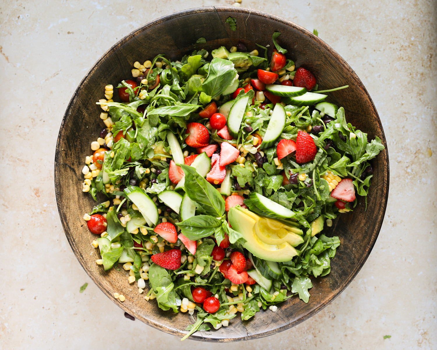 Colorful summer salad in serving bowl.