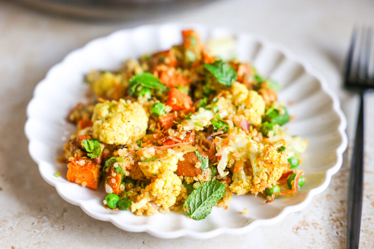 Cauliflower salad on a white plate.